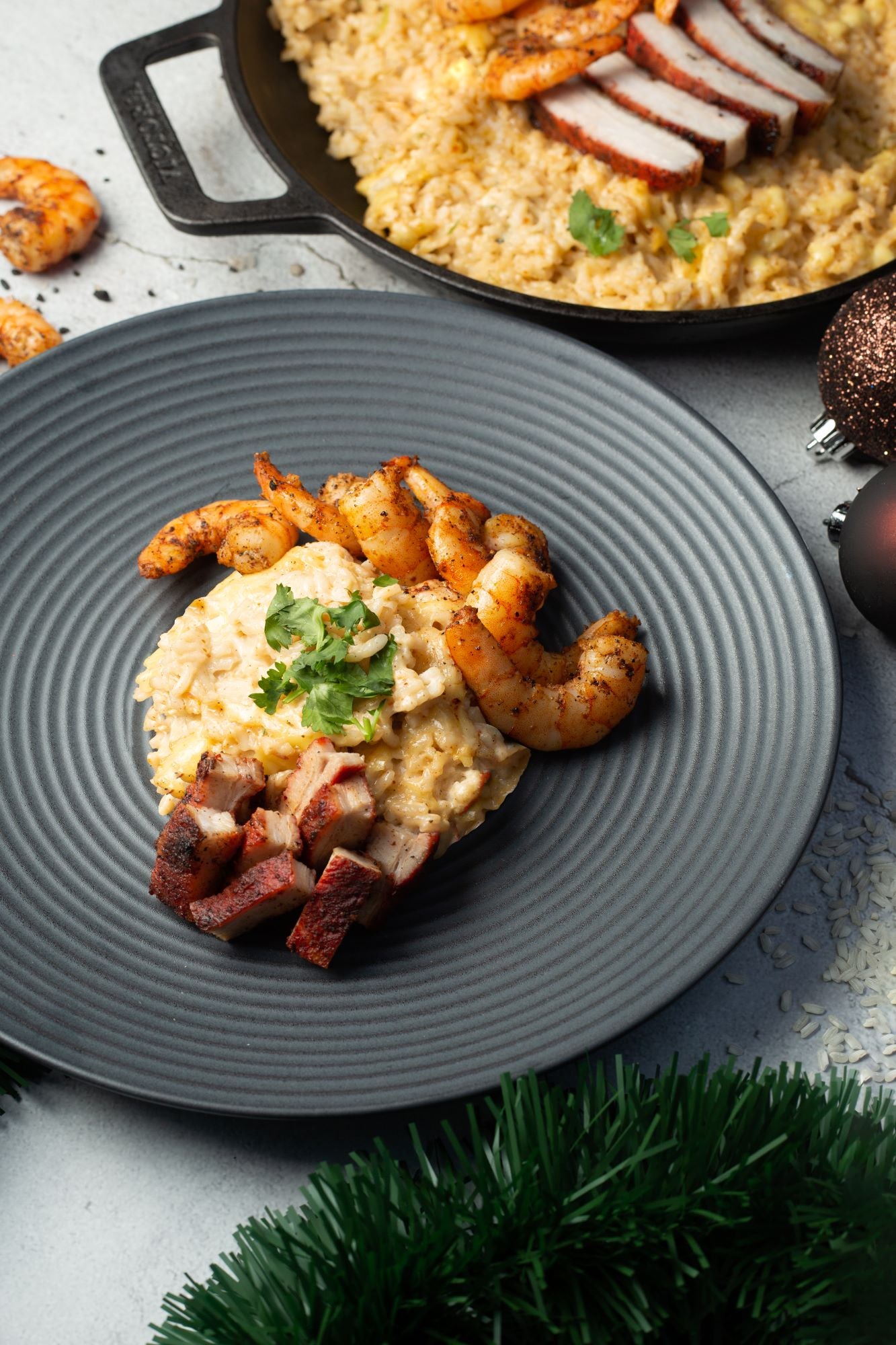 Arroz cremoso con camarones asados y Matambre de cerdo Proan
